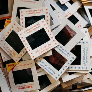 A pile of slide film photographs